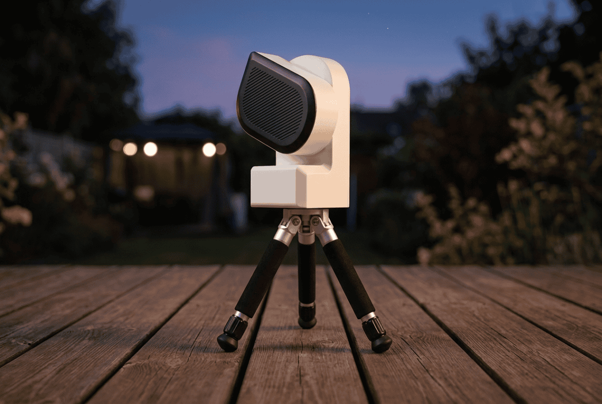 Close-up of the ZWO Seestar S50 all-in-one smart telescope on its tripod at dusk